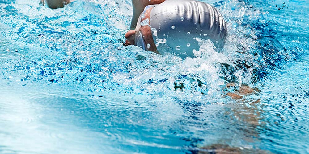 What should you do if your swimming pool has low free chlorine and high combined chlorine?